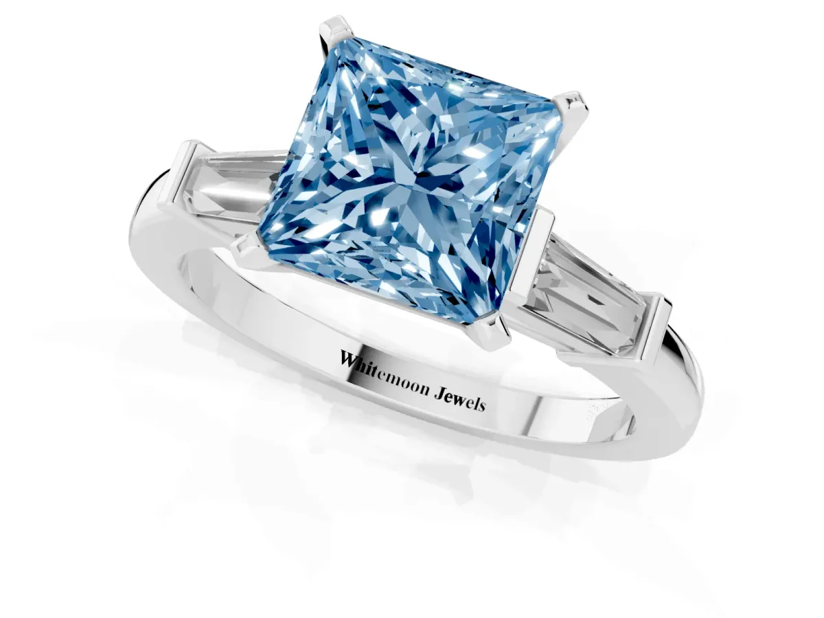 Fancy Blue Princess Cut Cut Diamond Solitaire Ring with Tapered Baguette Accents and Four-Prong Setting Platinum