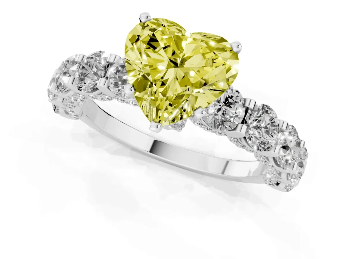 Fancy Yellow Heart Cut Diamond Side Stone Engagement Ring with Four-Prong Setting Silver