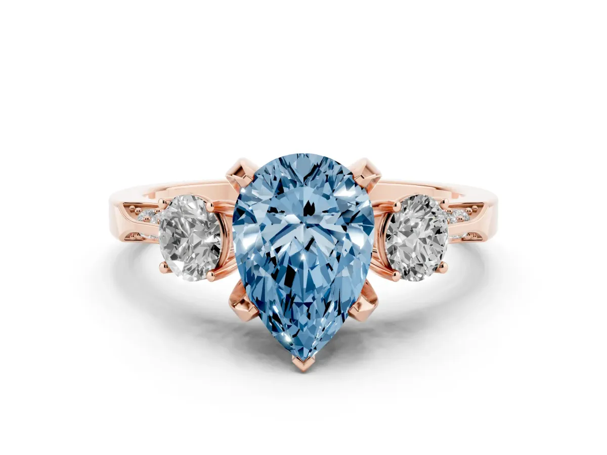 Fancy Blue Pear Cut Brilliant Three-Stone Diamond Ring with Pavé Band and Four-Prong Setting Rose gold