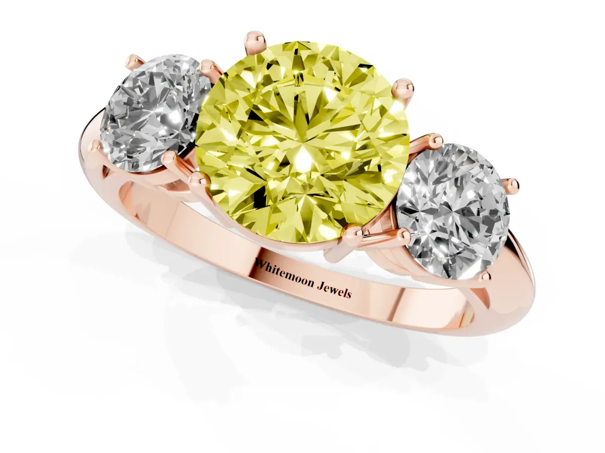 Fancy Yellow Three-Stone Round Cut Cut Diamond Engagement Ring with Prong Setting on a White Gold Band Rose gold