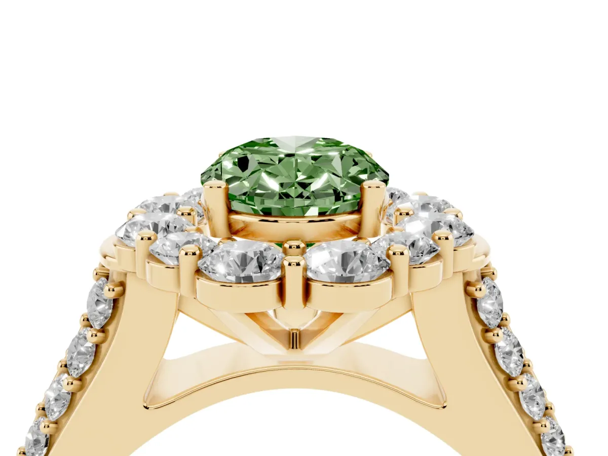 Fancy Green Oval Cut Halo Diamond Engagement Ring with Split Shank and Prong Setting Yellow gold