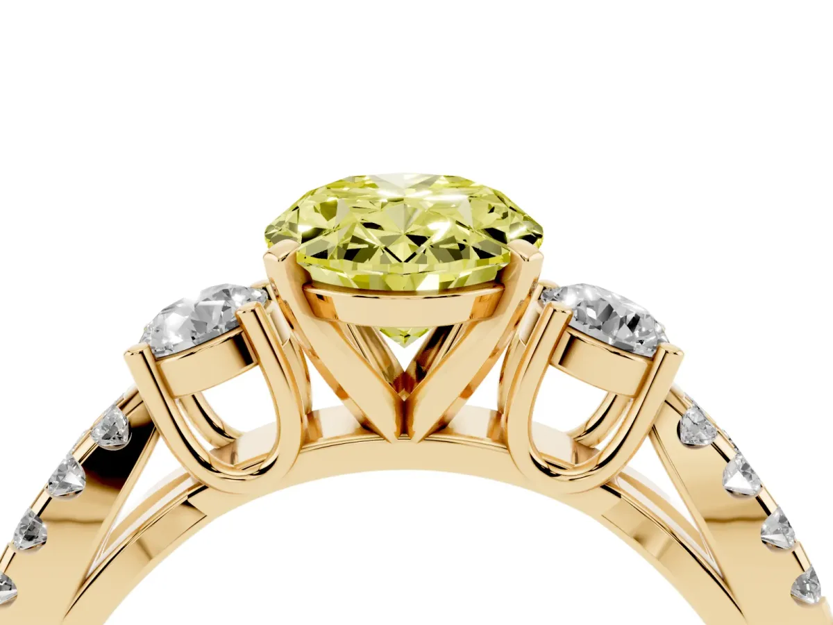 Fancy Yellow Oval Cut Diamond Three-Stone Ring with Pavé Split Shank and Four-Prong Setting Yellow gold