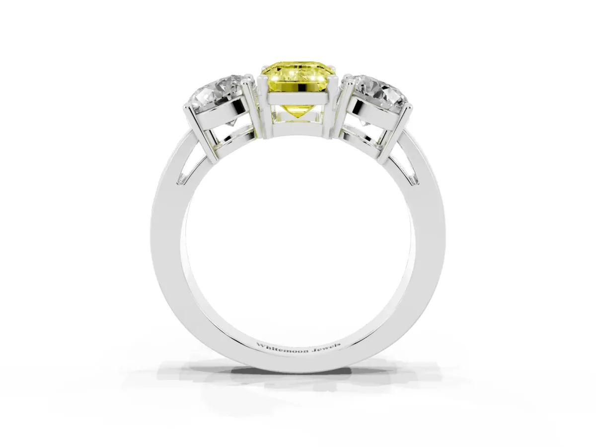 Fancy Yellow Three-Stone Emerald Cut Diamond Ring with Round Side Stones, Classic Band, and Four-Prong Setting Silver