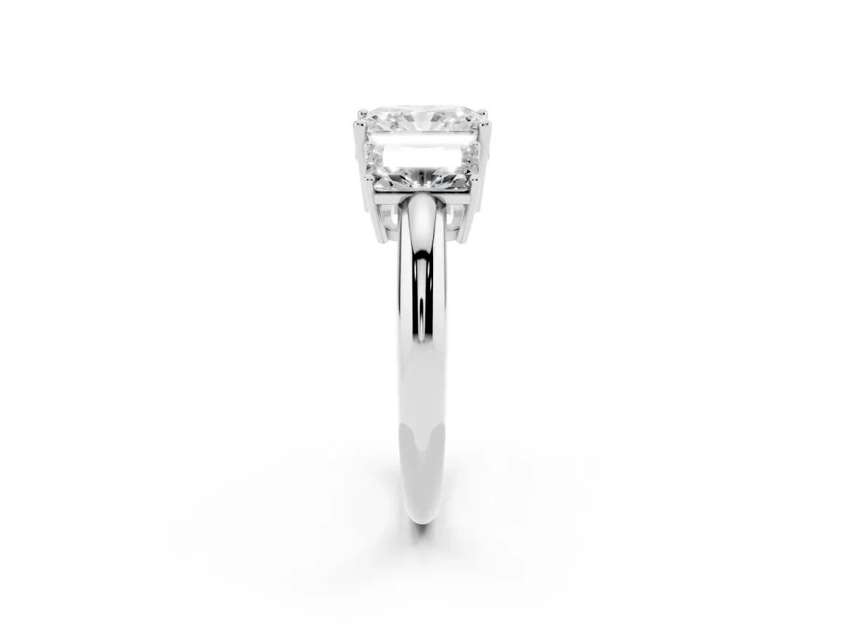 Three-Stone Radiant Cut Cut Diamond Engagement Ring with Prong Setting on a White Gold Band Platinum