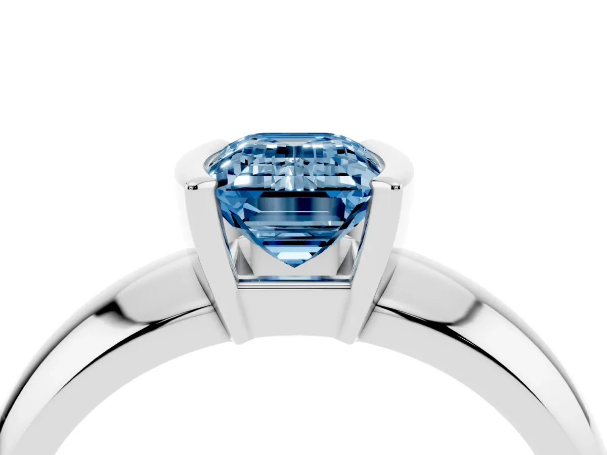Fancy Blue Emerald Cut Solitaire Tension Set Diamond Ring with Wide Band Silver