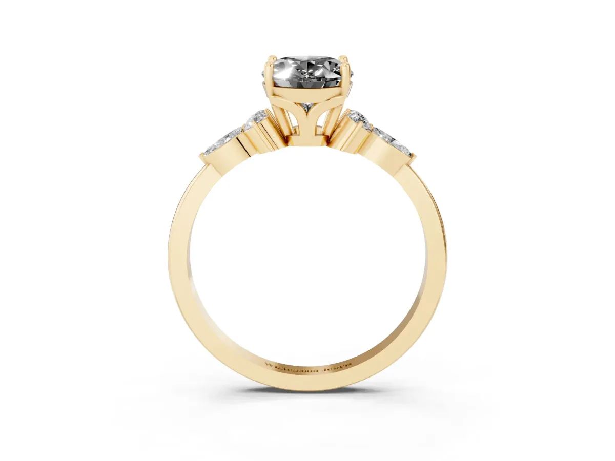 Fancy Black Oval Cut Brilliant Diamond Solitaire Ring with Pear Side Stones and Four-Prong Setting Yellow gold