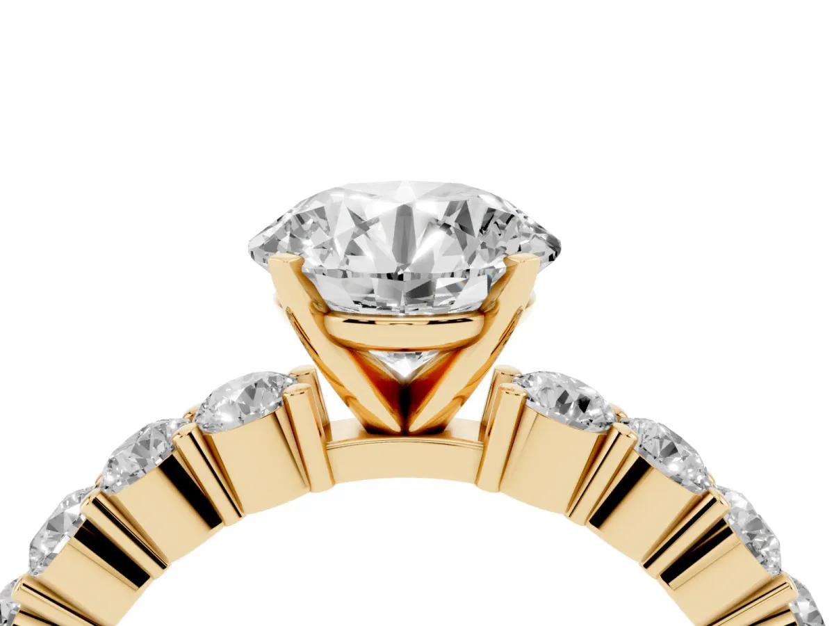 Round Cut Diamond Solitaire Ring with Shared Prong Round Side Stones Yellow gold