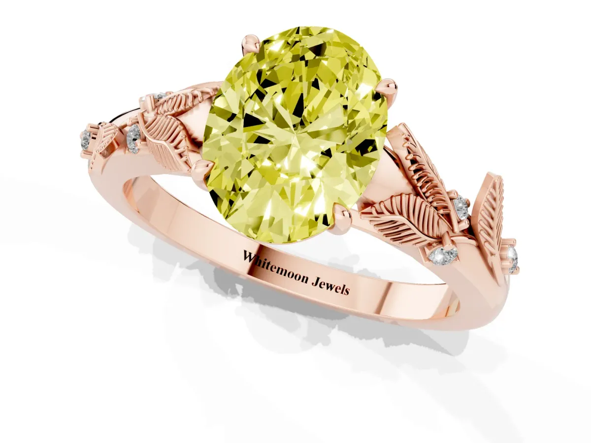 Fancy Yellow Oval Cut Diamond Solitaire Ring with Leaf Motif Band and Four-Prong Setting Rose gold