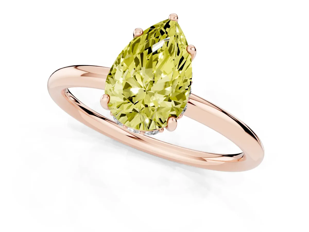 Fancy Yellow Pear Cut Solitaire Diamond Ring with a Classic Band and Four-Prong Setting Rose gold