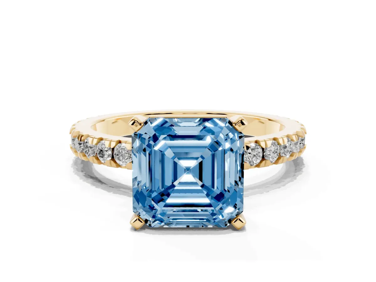 Fancy Blue Asscher Cut Diamond Pavé Band Solitaire with Four-Prong Setting Yellow gold