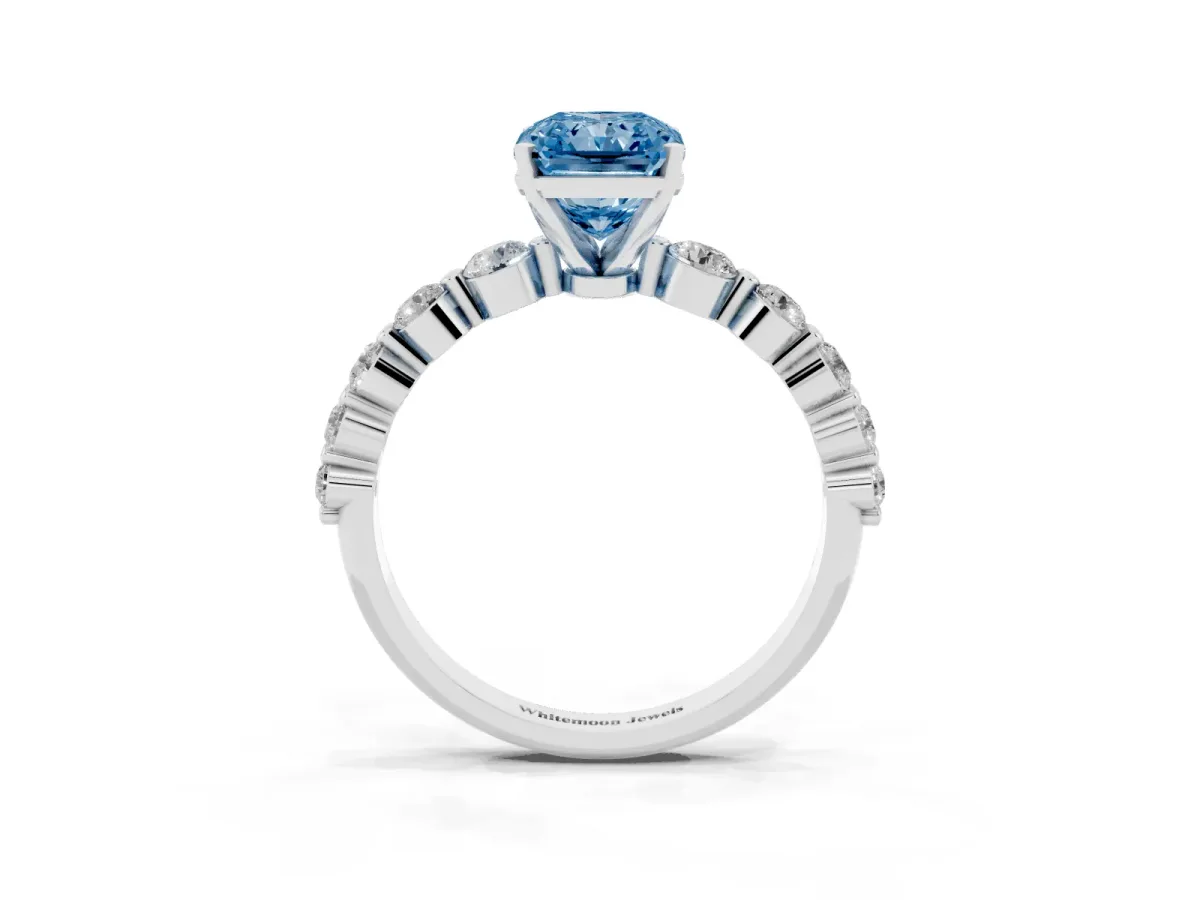 Fancy Blue Radiant Cut Solitaire Diamond Ring with Pave Band and Four-Prong Setting Silver