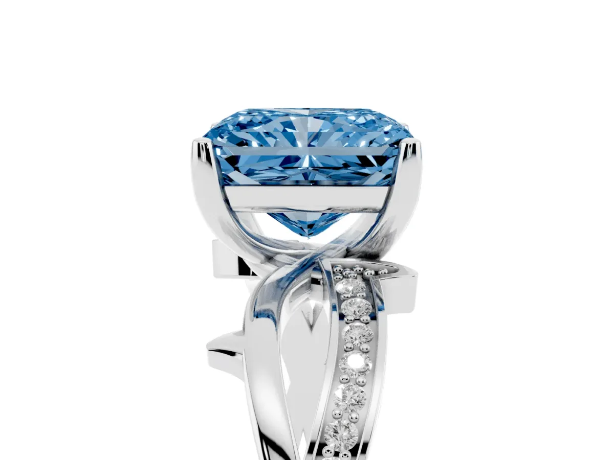 Fancy Blue Radiant Cut Solitaire Twist Band with Pavé Accents and Four-Prong Setting Silver