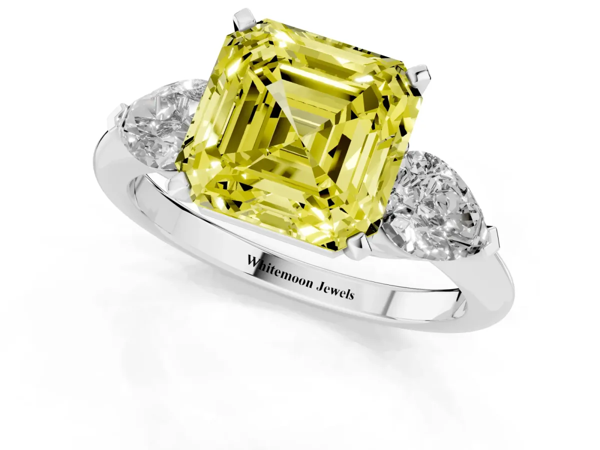 Fancy Yellow Three-Stone Asscher Cut Diamond Ring with Pear Side Stones and Four-Prong Setting Silver