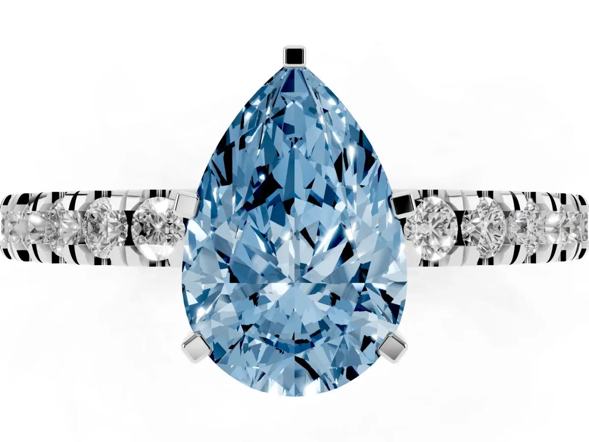 Fancy Blue Pear Cut Solitaire Diamond with Pavé Band and Four-Prong Setting Silver