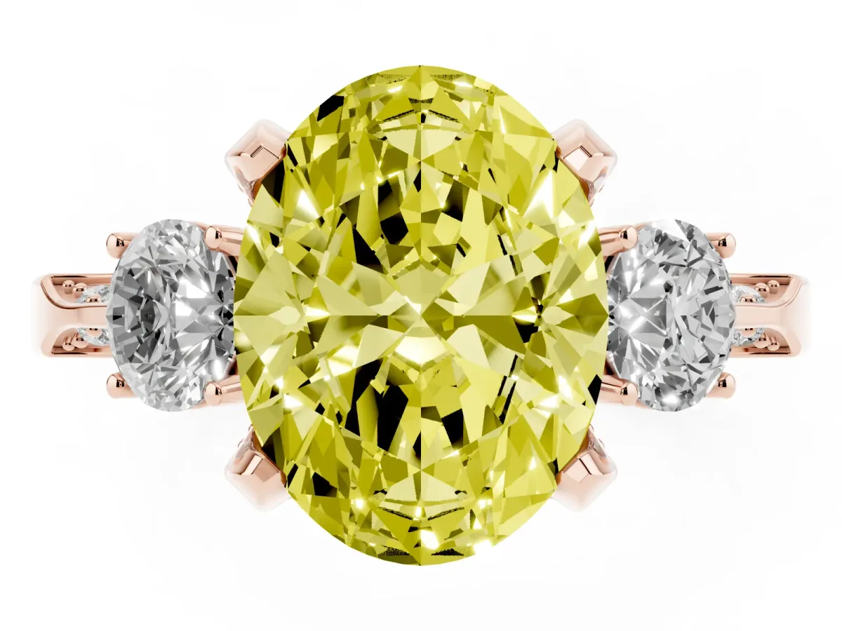 Fancy Yellow Oval Cut Brilliant Three-Stone Diamond Ring with Pavé Band and Four-Prong Setting Rose gold
