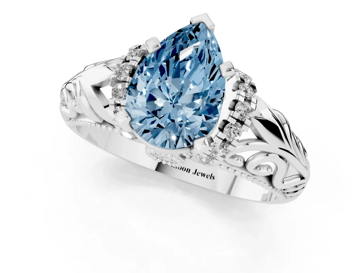 Fancy Blue Pear Cut Solitaire Filigree Engagement Ring with Halo and Prong Setting Silver