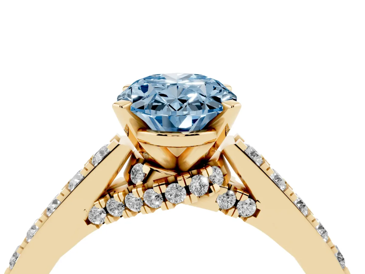 Fancy Blue Oval Cut Diamond Solitaire Ring with Crossover Gallery and Round Pavé Band Yellow gold