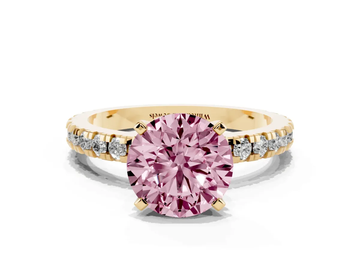 Fancy Pink Round Cut Diamond Pavé Band Solitaire with Four-Prong Setting Yellow gold