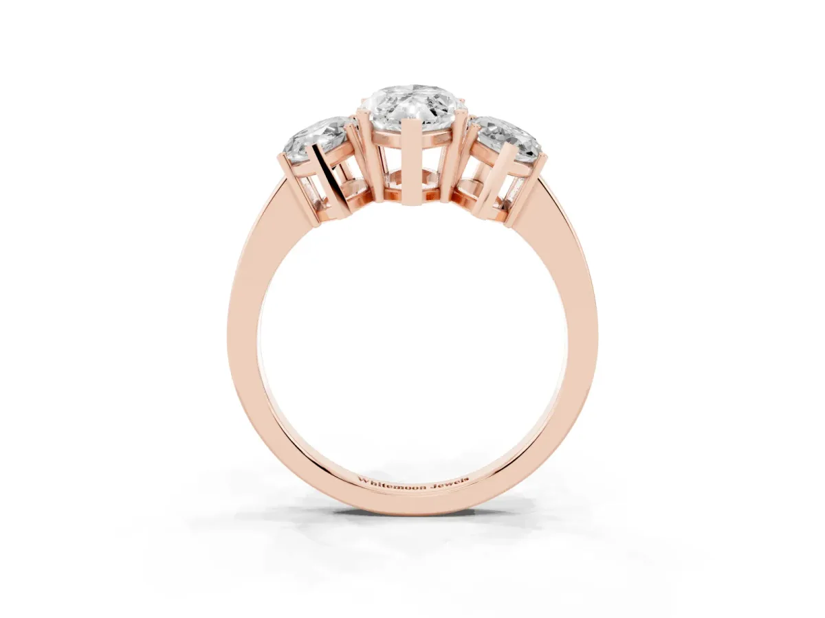 Three-Stone Marquise Cut Cut Diamond Engagement Ring with Flat Band and Four-Prong Setting Rose gold