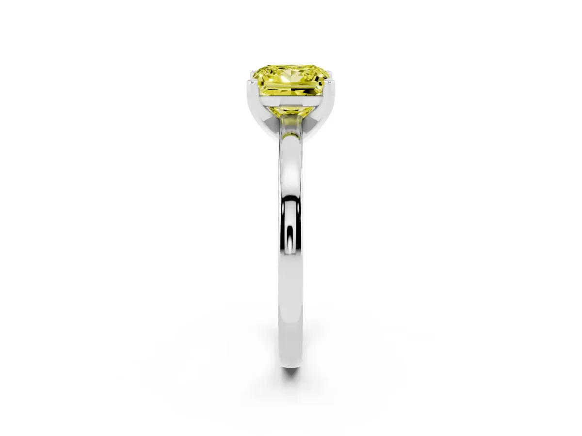 Fancy Yellow Princess Cut Solitaire Diamond Engagement Ring with Four-Prong Setting on a Classic Band Silver