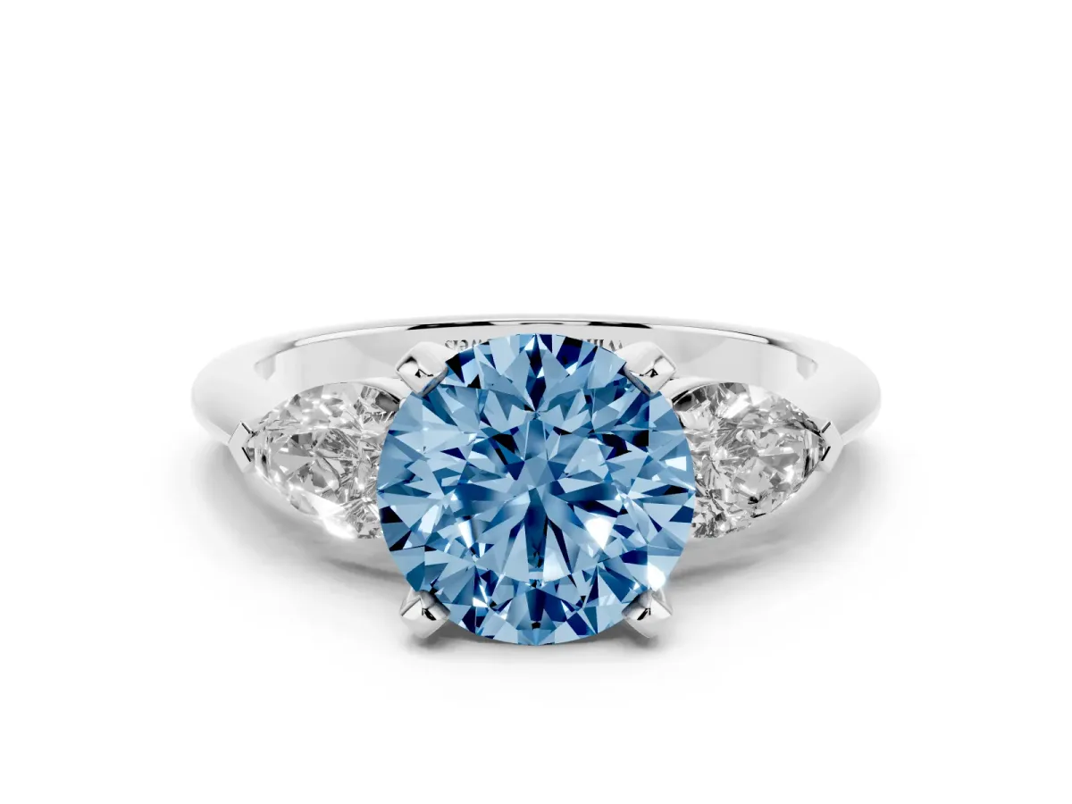 Fancy Blue Three-Stone Round Cut Diamond Ring with Pear Side Stones and Four-Prong Setting Platinum