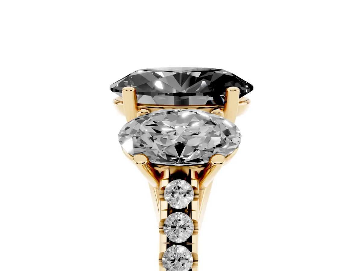 Fancy Black Three-Stone Oval Cut Diamond Ring with Round Pavé Band and Prong Setting Yellow gold