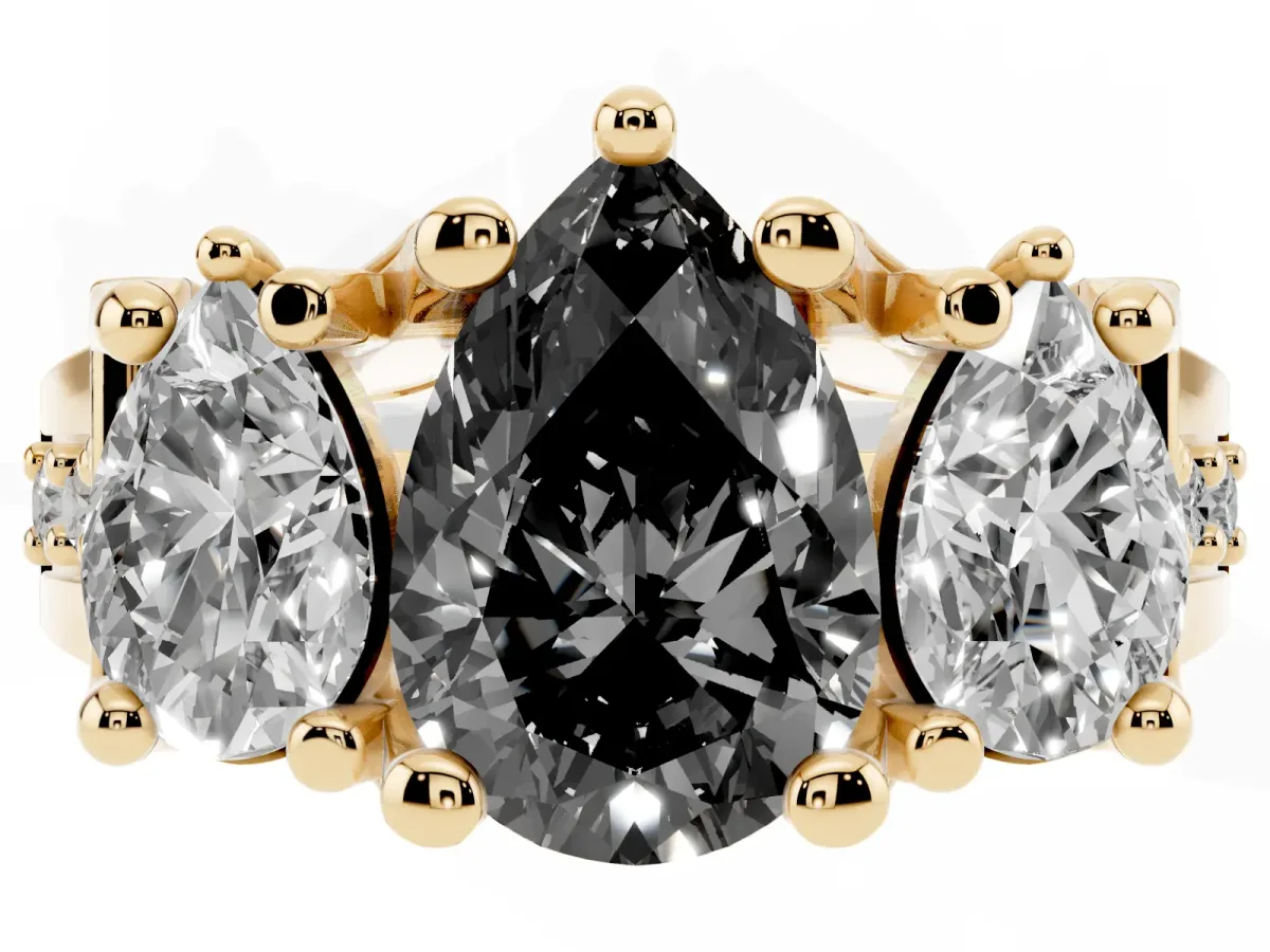 Fancy Black Pear Cut Diamond Three-Stone Ring with Channel Set Band and Four-Prong Setting Yellow gold