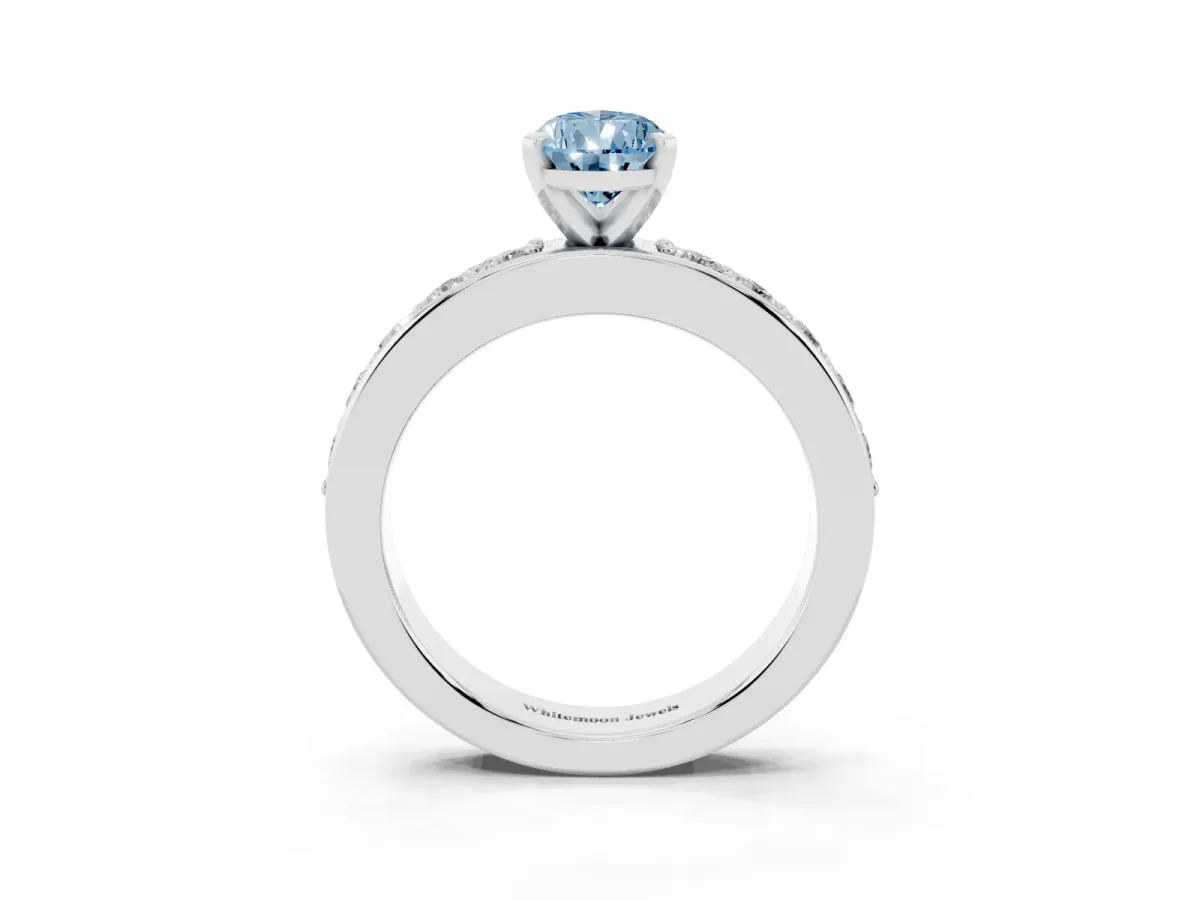 Fancy Blue Pear Cut Diamond Engagement Ring with Channel Set Round Band and Prong Setting Silver