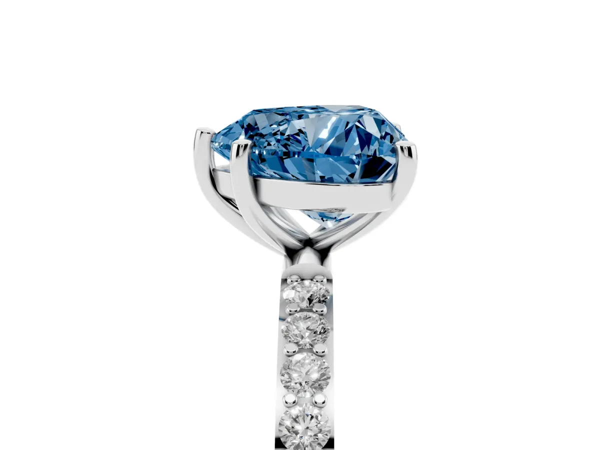 Fancy Blue Heart Cut Diamond Solitaire Ring with Round Pavé Shoulders and Prong Setting Silver
