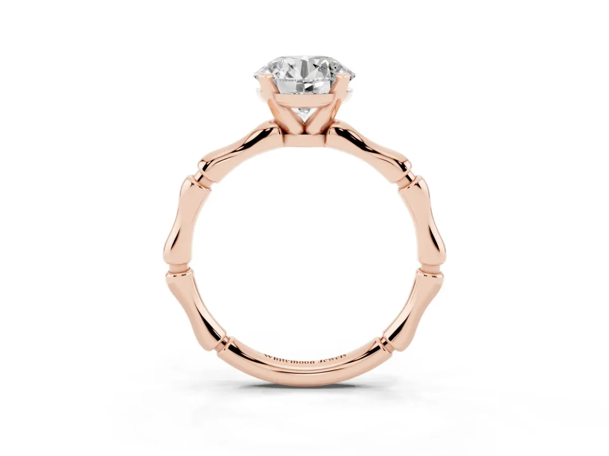 Round Cut Solitaire Diamond Ring with Bamboo Band and Four-Prong Setting Rose gold