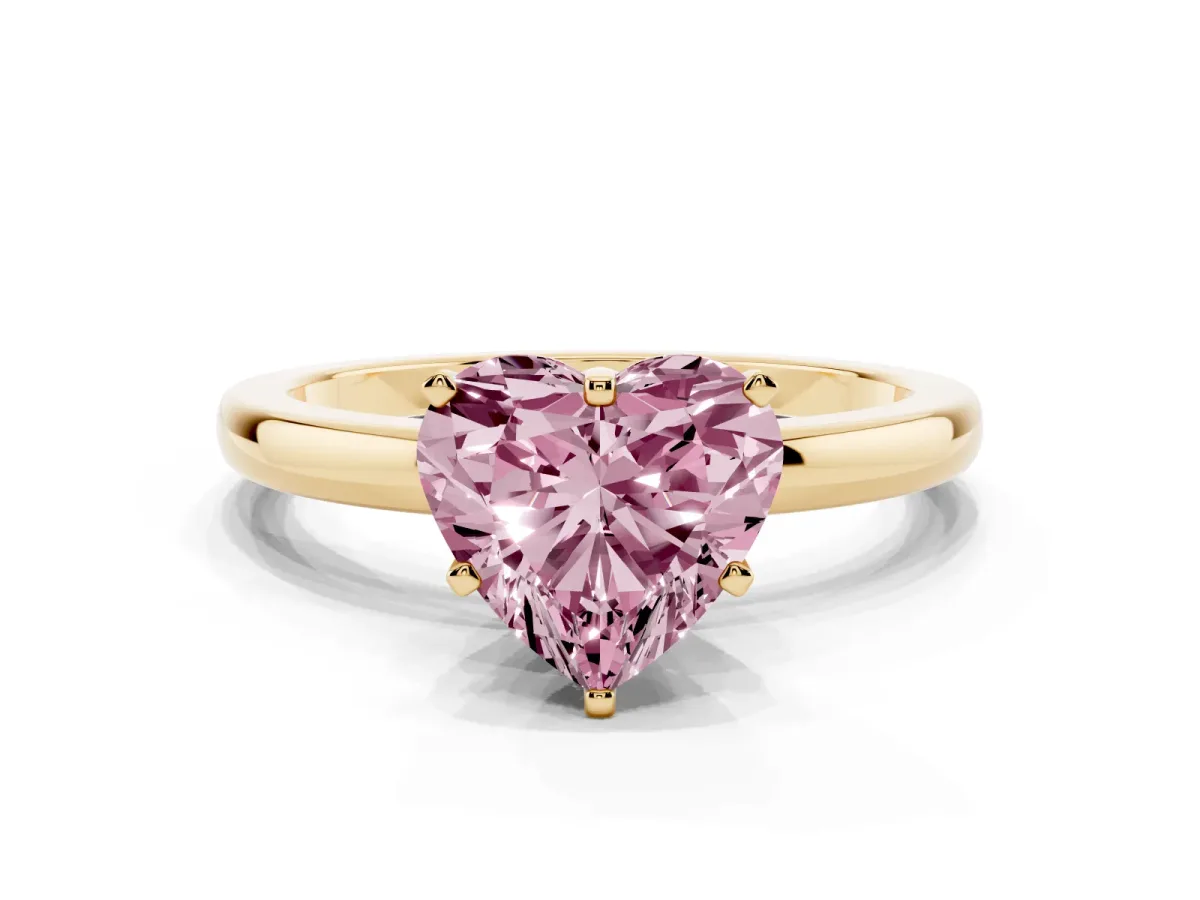 Fancy Pink Heart Cut Solitaire Diamond Ring with Six-Prong Setting on a Classic Band Yellow gold
