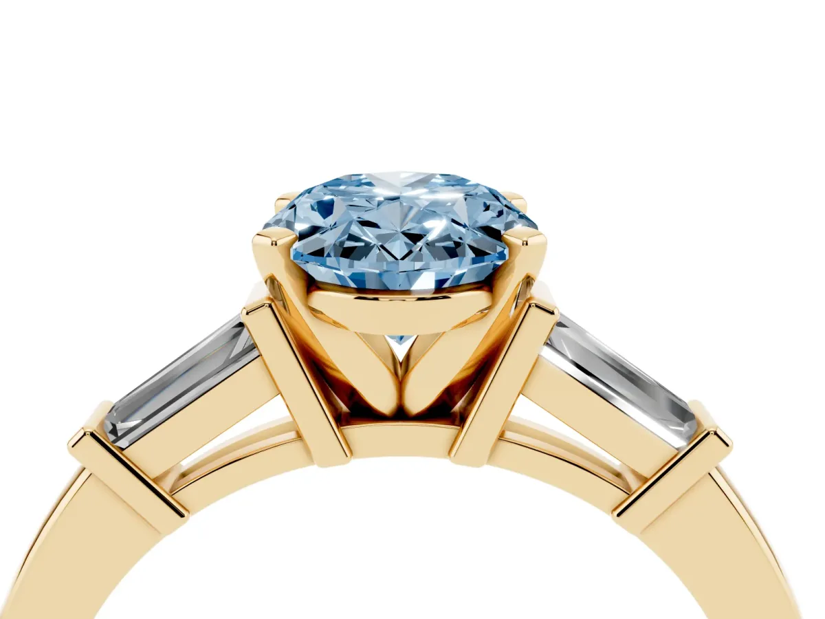 Fancy Blue Oval Cut Cut Diamond Solitaire Ring with Tapered Baguette Accents and Four-Prong Setting Yellow gold