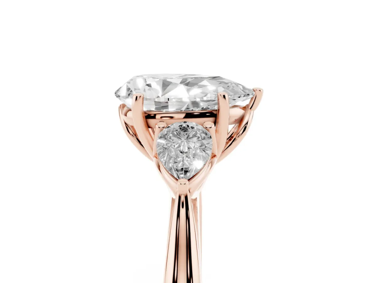 Three-Stone Pear Cut Brilliant Diamond Solitaire Ring with Tapered Band and Four-Prong Setting Rose gold