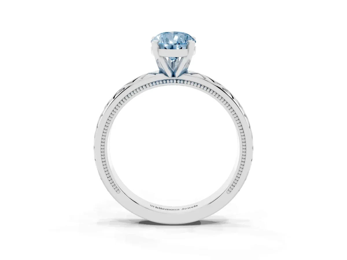 Fancy Blue Pear Cut Solitaire Diamond Ring with Milgrain and Black Enamel X Pattern Band Silver