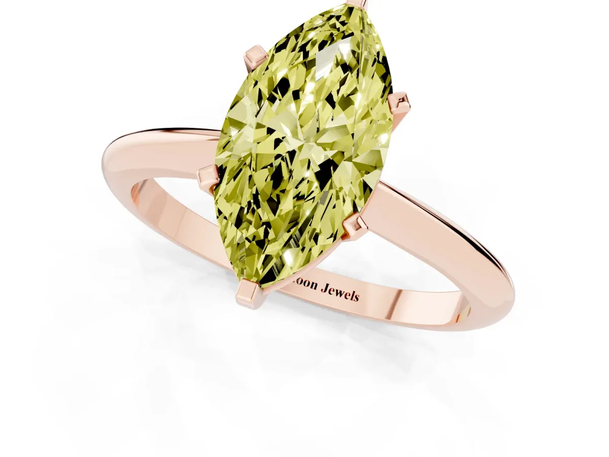 Fancy Yellow Marquise Cut Cut Solitaire Ring with Four-Prong Setting on a Classic Band Rose gold