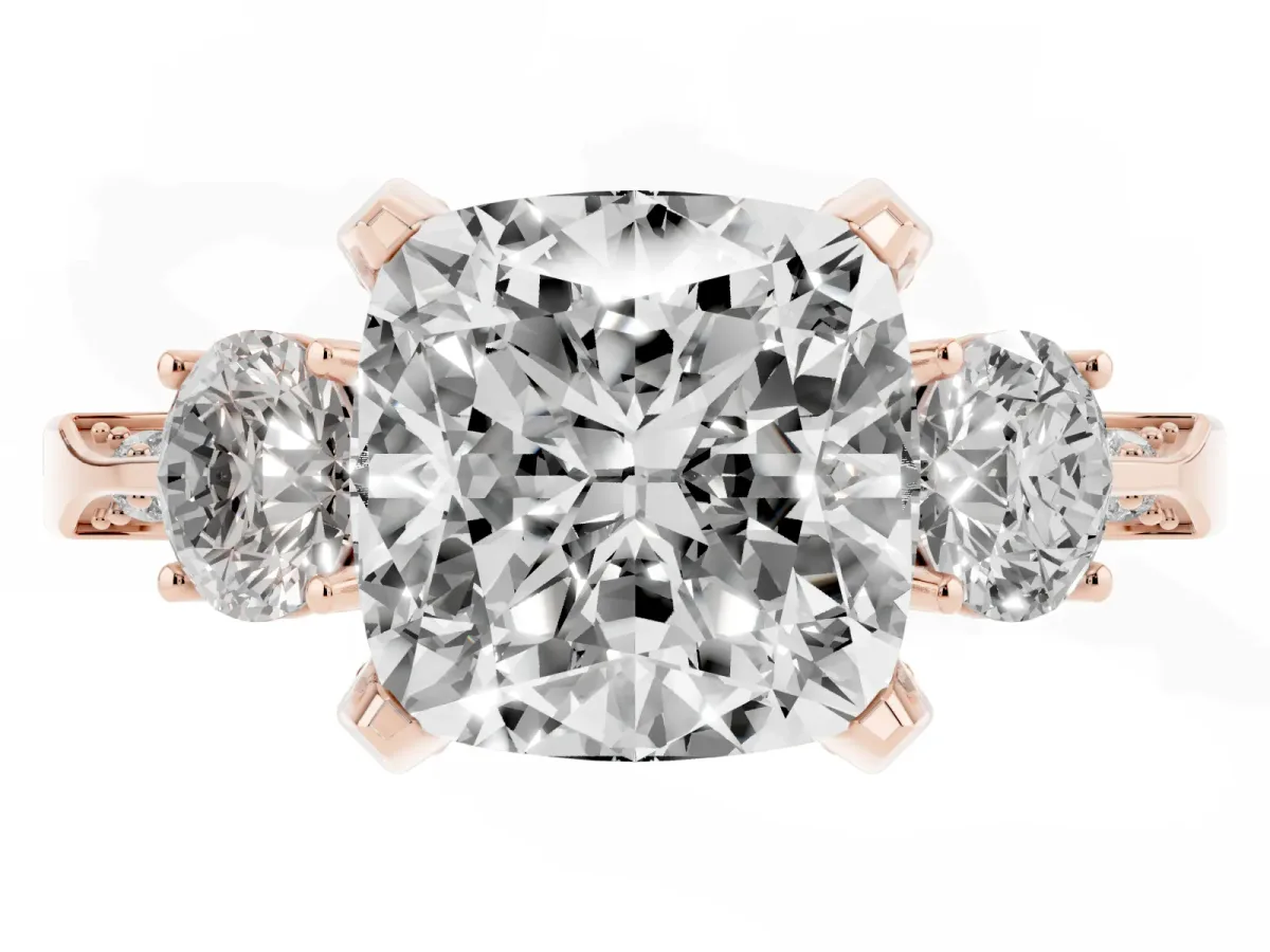 Cushion Cut Brilliant Three-Stone Diamond Ring with Pavé Band and Four-Prong Setting Rose gold