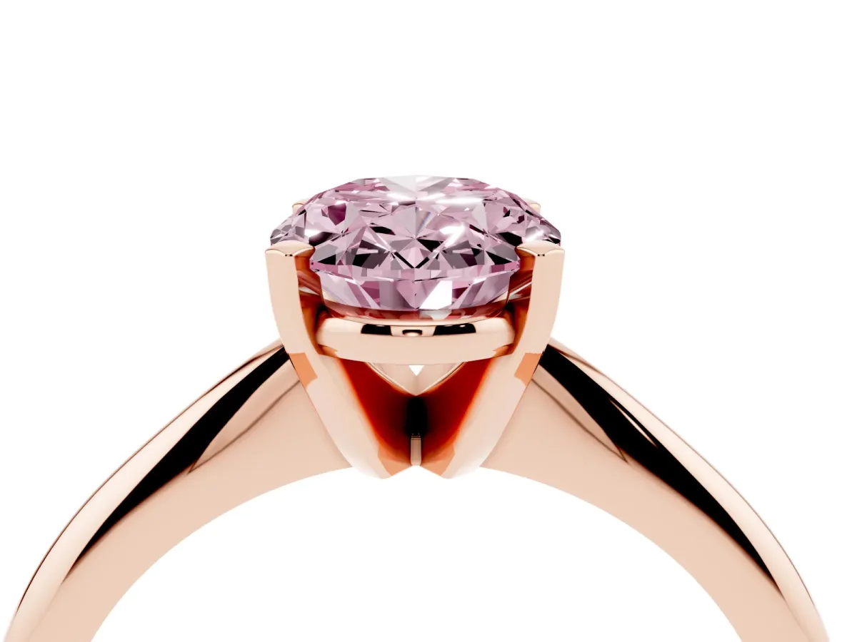 Fancy Pink Oval Cut Cut Solitaire Ring with Four-Prong Setting on a Classic Band Rose gold
