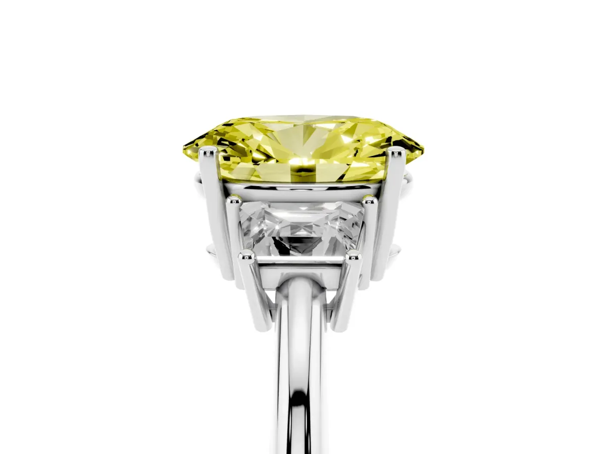 Fancy Yellow Oval Cut Diamond Three-Stone Ring with Trapezoid Side Stones and Prong Setting Platinum