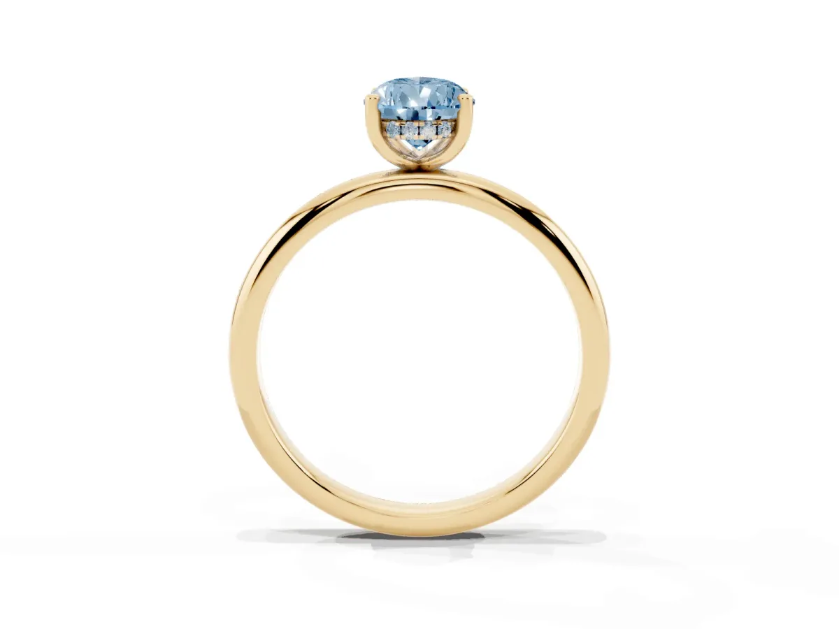 Fancy Blue Pear Cut Cut Solitaire Engagement Ring with Four-Prong Setting and Classic Band Yellow gold