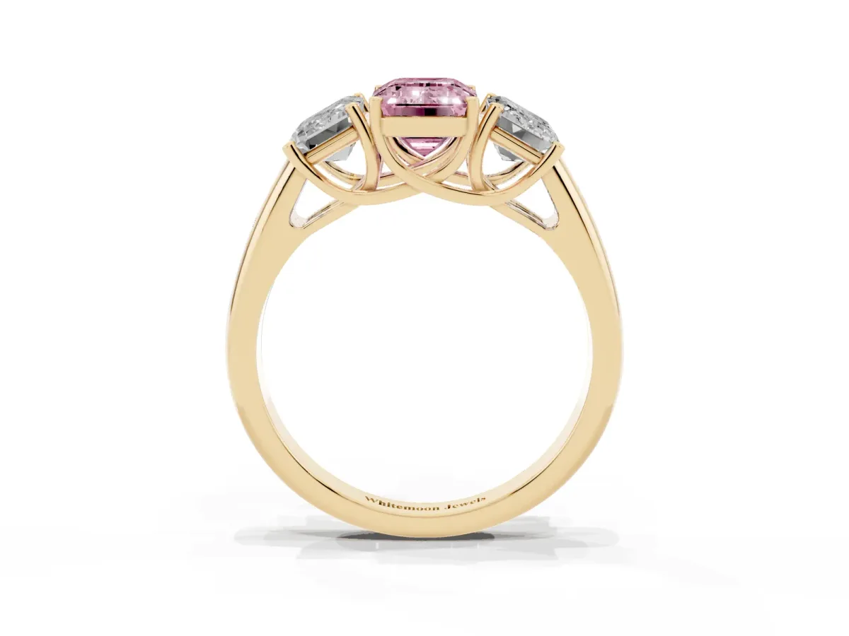 Fancy Pink Three-Stone Emerald Cut Diamond Engagement Ring with Prong Setting Yellow gold