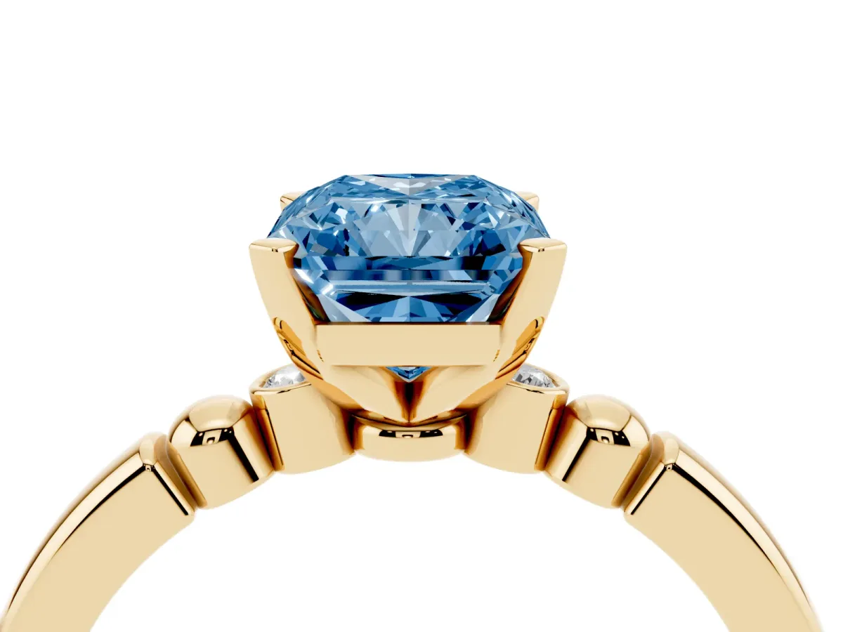 Fancy Blue Radiant Cut Solitaire Beaded Band with Four-Prong Setting Yellow gold