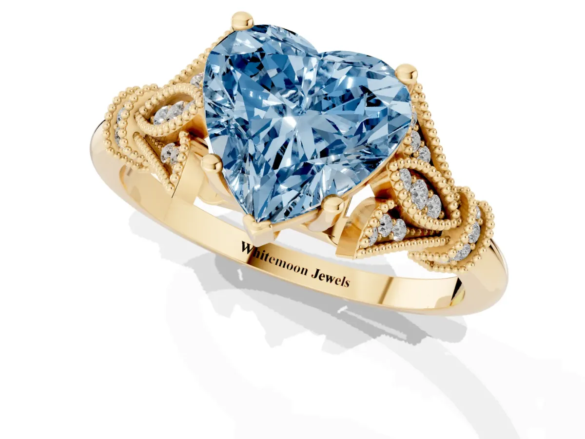 Fancy Blue Heart Cut Diamond Solitaire Ring with Floral Filigree and Pave Accents Yellow gold