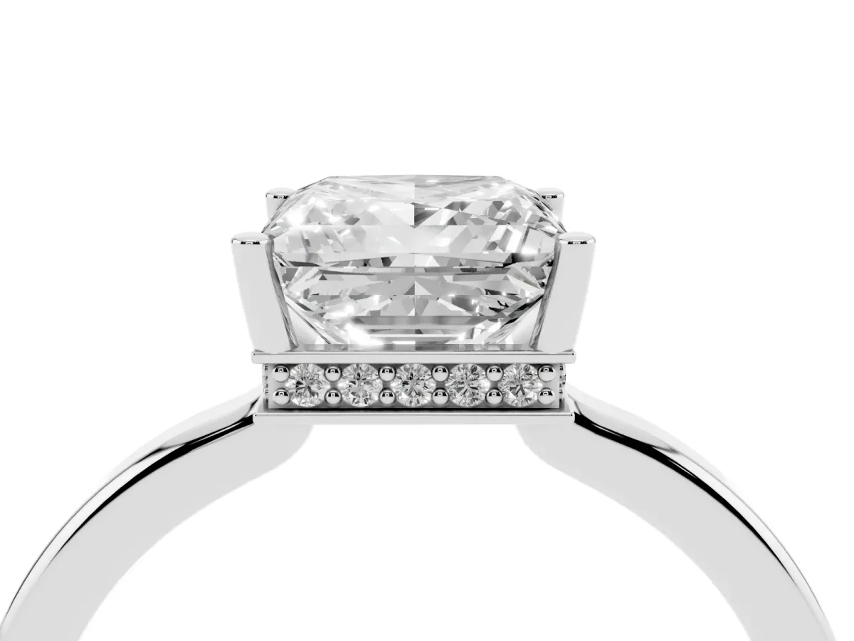 Princess Cut Cut Solitaire Engagement Ring with Four-Prong Setting on a Classic Band Silver