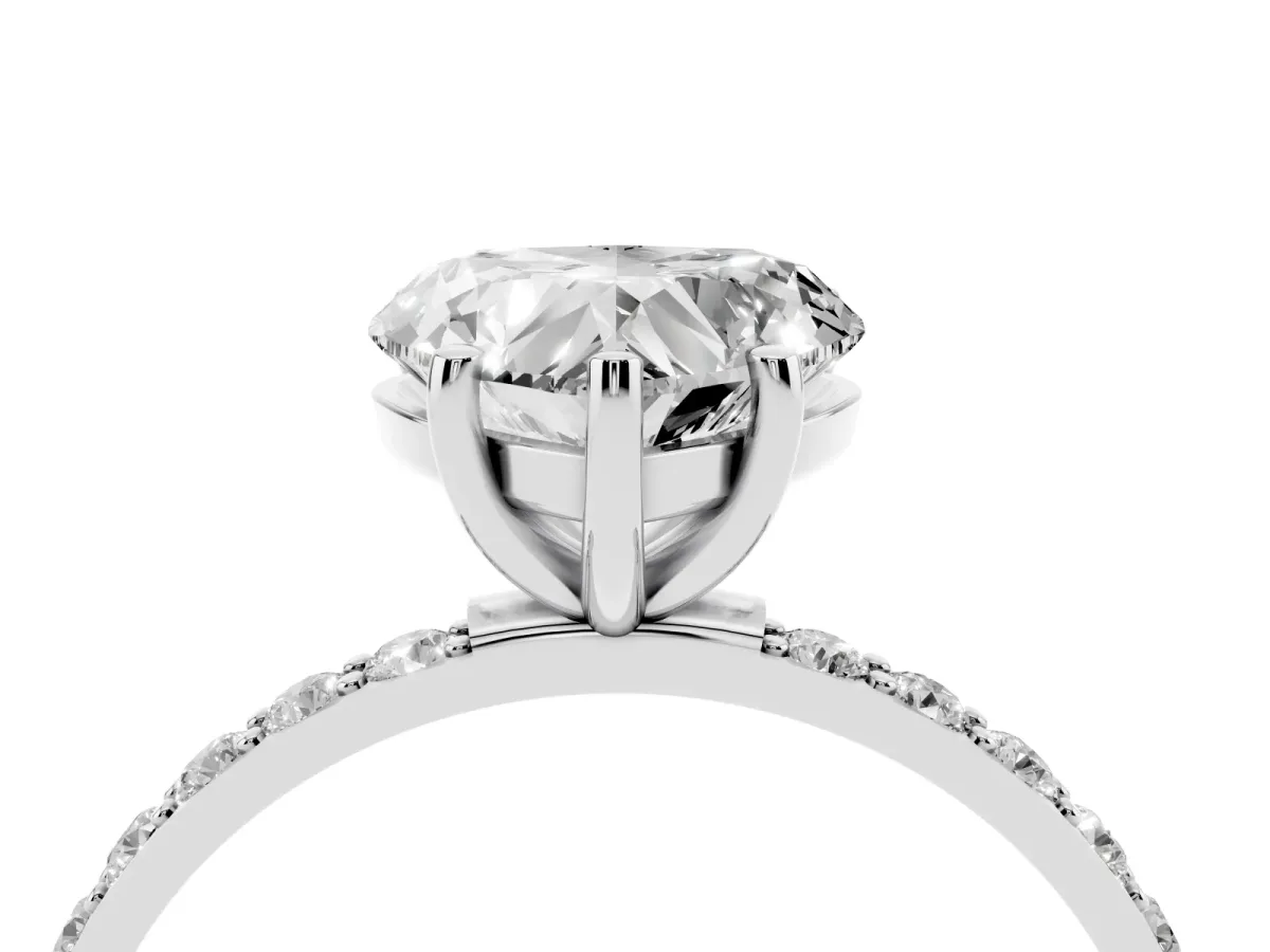Heart Cut Diamond Solitaire Ring with Round Pavé Shoulders and Prong Setting Silver