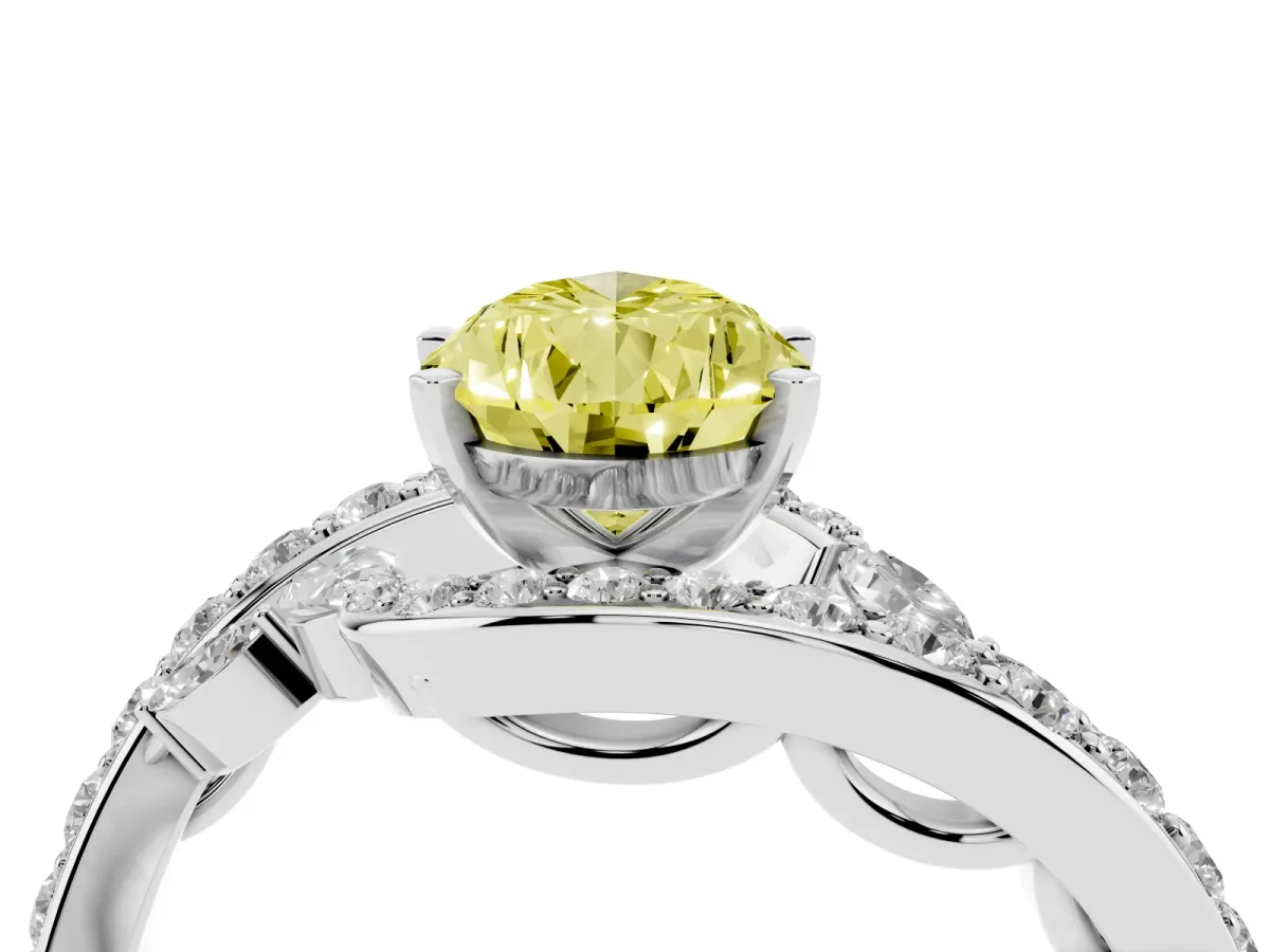 Fancy Yellow Pear Cut Solitaire with Pavé Twist Band and Four-Prong Setting Silver