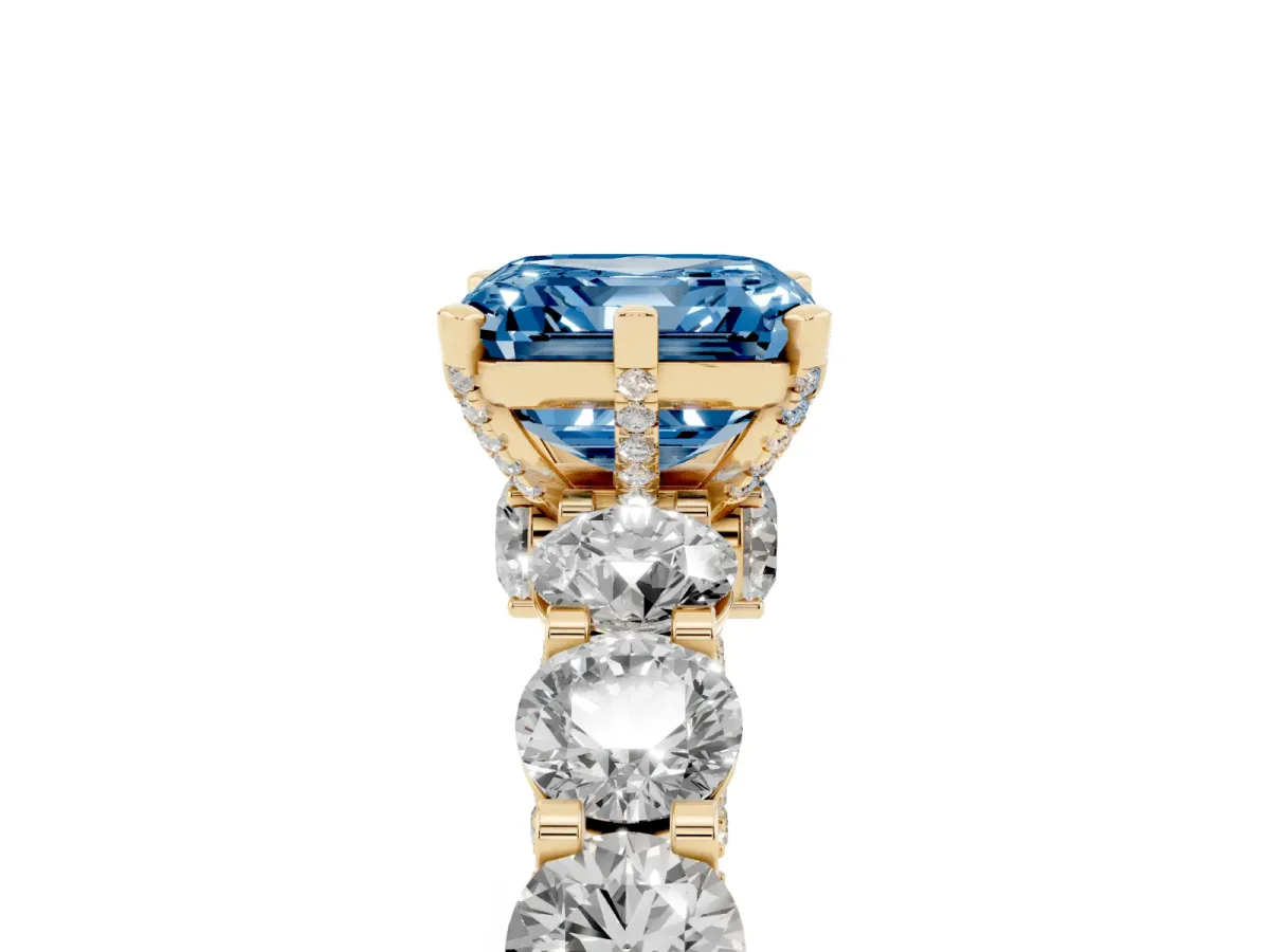 Fancy Blue Asscher Cut Diamond Side Stone Engagement Ring with Four-Prong Setting Yellow gold