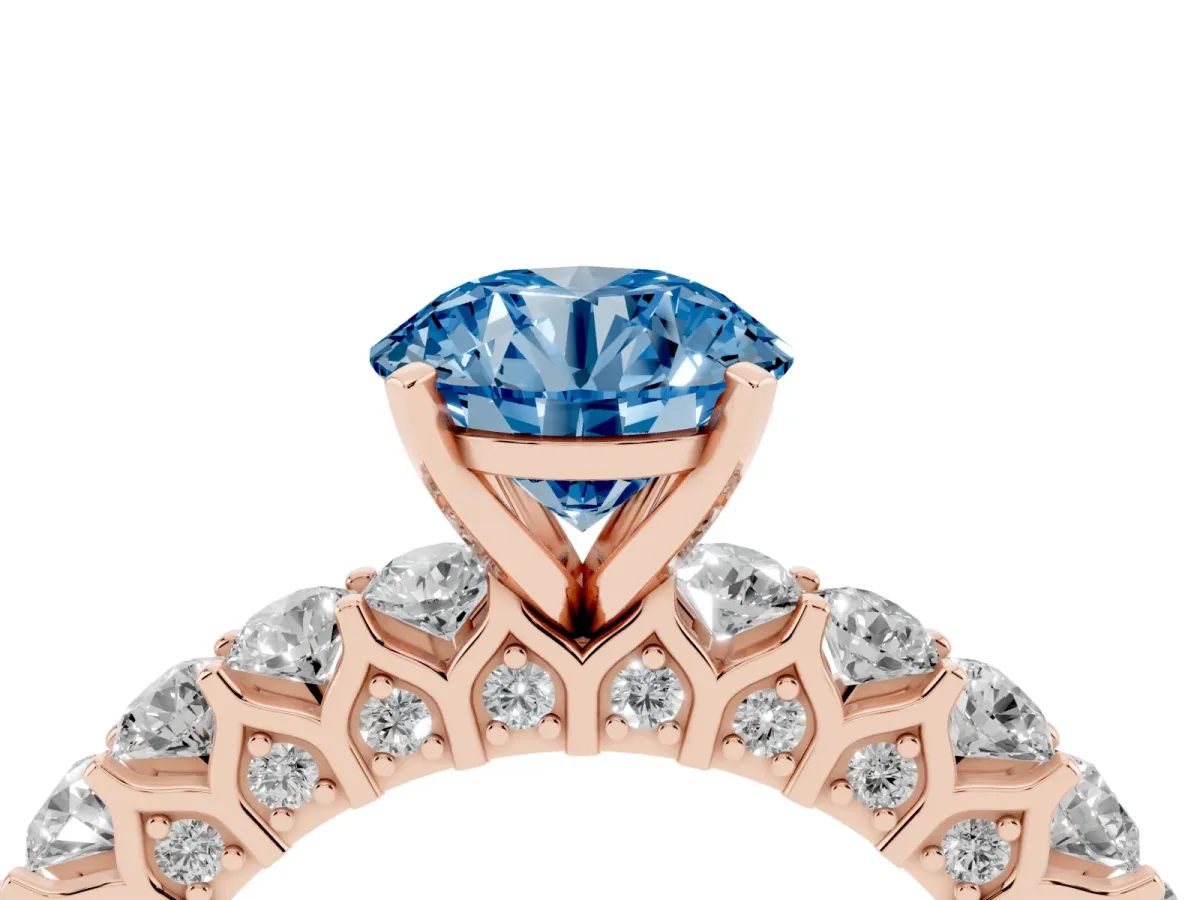 Fancy Blue Round Cut Diamond Solitaire Ring with Shared Prong Pavé Band and Four-Prong Setting Rose gold