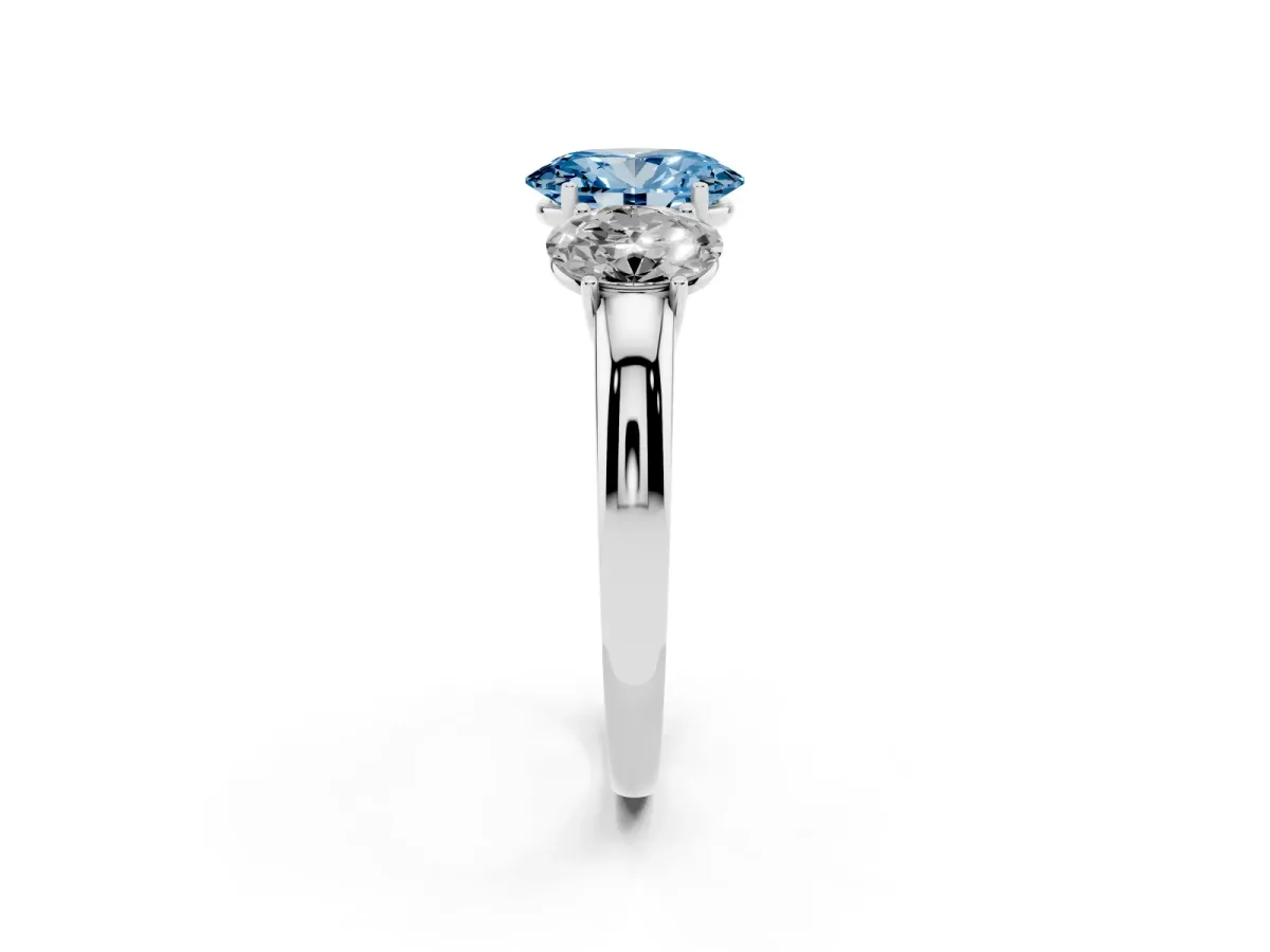 Fancy Blue Oval Cut Diamond Three-Stone Ring with Four-Prong Setting and Classic Band Platinum