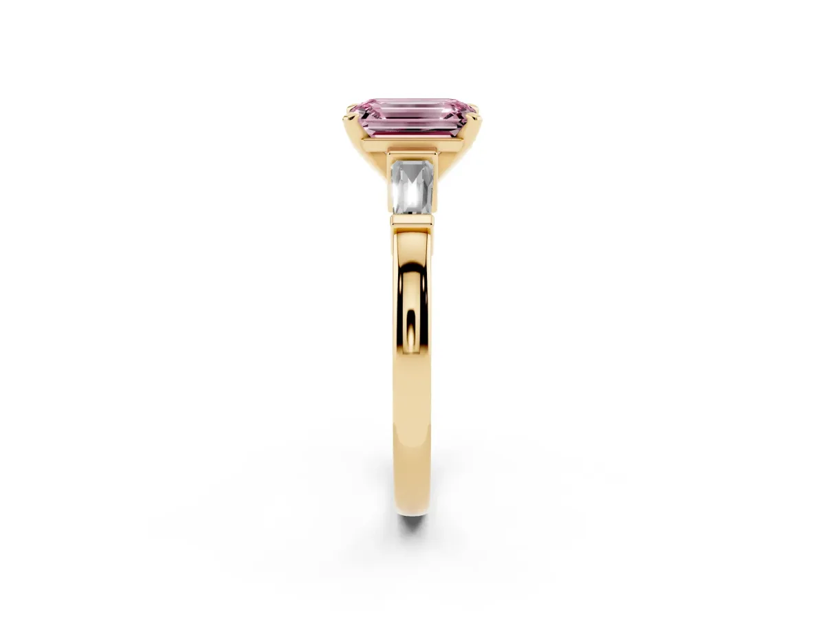 Fancy Pink Emerald Cut Cut Diamond Solitaire Ring with Tapered Baguette Accents and Four-Prong Setting Yellow gold