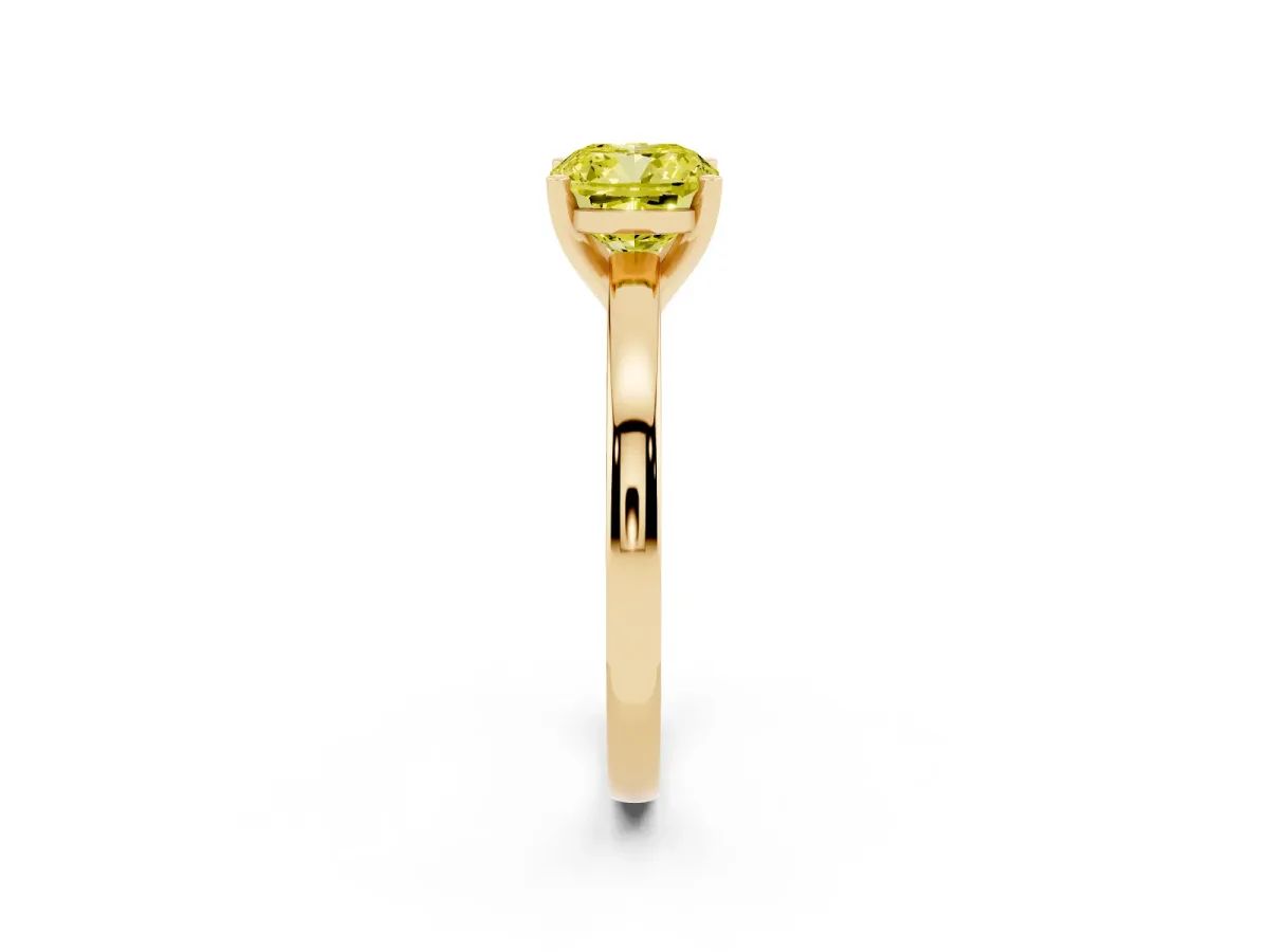 Fancy Yellow Cushion Cut Solitaire Diamond Engagement Ring with Four-Prong Setting on a Classic Band Yellow gold